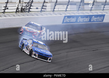 Joliet, Illinois, USA. 1st July, 2018. Kyle Larson (42) goes for a spin after connect with Kyle Busch (18) while coming to the checkered flag to win the Overton's 400 at Chicagoland Speedway in Joliet, Illinois Credit: Chris Owens Asp Inc/ASP/ZUMA Wire/Alamy Live News Stock Photo