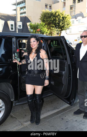 Hollywood, California, USA. 30th June, 2018. Carol Suarez, one of the bridesmaids, arrives at 'Rock & Roll Drummer Joey Durant's Wedding Celebration' at the Rainbow in Hollywood, California on June 30, 2018.  Credit:  Sheri Determan/Alamy Live News Stock Photo