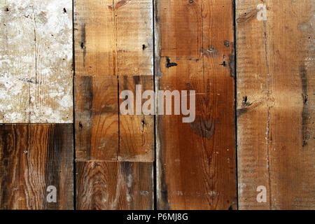 Rich colours in a wood grain background of timber planks of wood for panelling or floor covering. Stock Photo