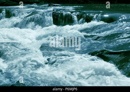 Toned landscape rapids stormy river. Stock Photo