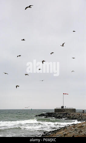 Warnemuende, people on the Westmole Stock Photo