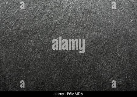 Natural black slate background. Dark gray texture. Stock Photo