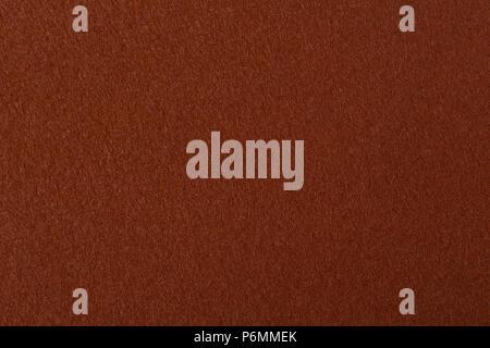 Background of dark brown felt. High resolution photo. Stock Photo