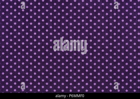 Close up of purple fabric and white tiny polka dots background. Hi res Stock Photo