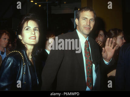 WESTWOOD, CA - DECEMBER 17: (L-R) Cindy Costner and actor Kevin Costner attend the 'JFK' Westwood Premiere on December 17, 1991 at Mann Village Theatre in Westwood, California. Photo by Barry King/17�Թ����� Stock Photo Stock Photo
