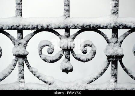 Close-up of metal gate with snow.  Saint-Gervais. France. Stock Photo