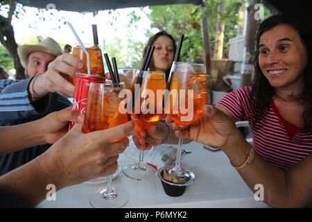 Friends having a toast in Salento, Italy. Stock Photo