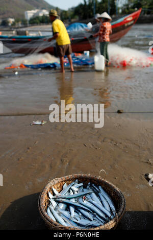 Fishermen preparing fishing net. Vung Tau. Vietnam. Stock Photo