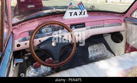 Close-up of a classic 1950's Plymouth taxi, locally known as 'almendrones' in the town of Cienfuegos, Cuba.