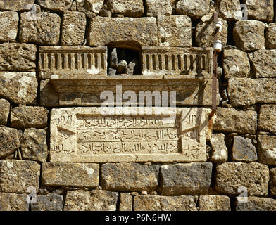 Syria. Bosra (Busra al-Sham). Daraa District. Islamic art. Arabic calligraphy. Detail of a panel on a wall. Stock Photo