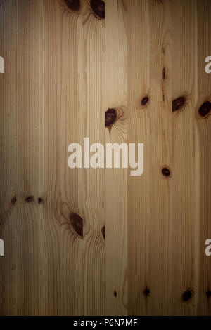 Full frame background of an unpainted wood board wall in closet with vignetting Stock Photo
