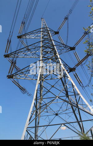 High voltage electricity pylons in Yorkshire field Stock Photo