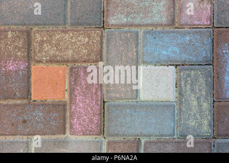 Pavement tile painted with colorful chalks. Children drawing on street. Bright multicolored background Stock Photo
