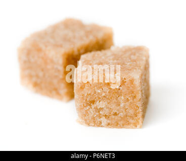 Brown sugar cubes. on white background Stock Photo