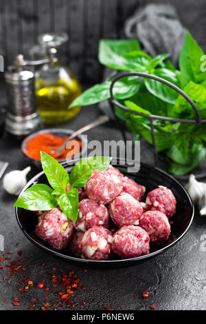 Beef meatballs. Cooking raw beef meatballs Stock Photo
