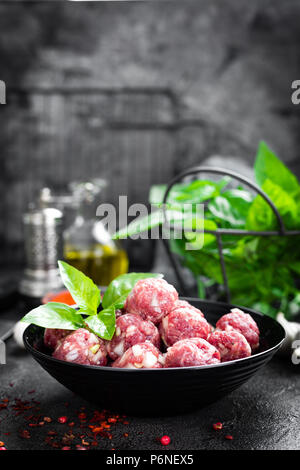 Beef meatballs. Cooking raw beef meatballs Stock Photo