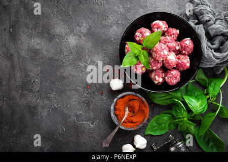 Beef meatballs. Cooking raw beef meatballs Stock Photo