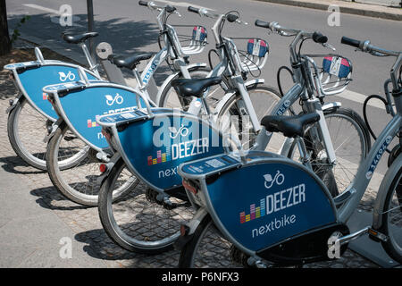 Berlin, Germany - june 2018:  Bicycles of Deezer nextbike, a bike sharing company  in the city of Berlin Stock Photo