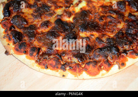 burnt Pizza Stock Photo