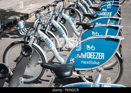 Berlin, Germany - june 2018: Bicycles of Deezer Nextbike, a bike sharing company    in Berlin, Germany Stock Photo