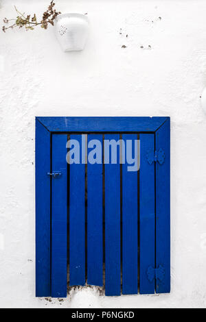 Traditional blue wooden window shutters in Bodrum, Turkey Stock Photo