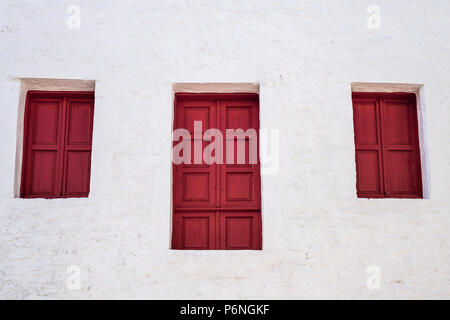 Traditional red wooden window shutters in Bodrum, Turkey Stock Photo