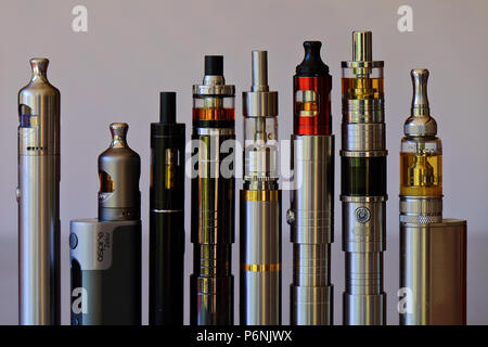 A set of different tube ecigarette devices for eletronic smoking or vaping with eliquid Stock Photo