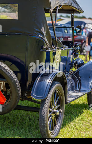 Shallow depth of field closeup of the passenger side of a 1923 Ford Model T Touring Car. Stock Photo