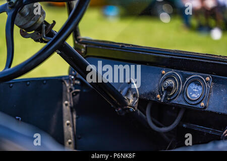 Shallow depth of field closeup of the dashboard and interior on a 1923 Ford Model T Touring Car. Stock Photo