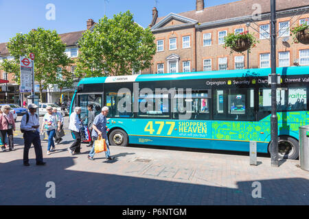 Buses dominate Orpington High Street on busy warm summer days, London Borough of Bromley, UK Stock Photo