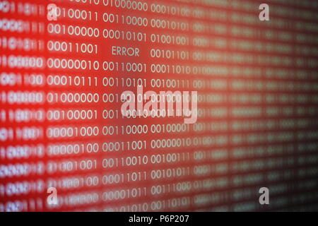 Red binary code with error text in the line of computer code. systematic line of code working in order. Stock Photo