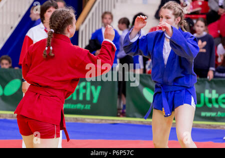 Russia, Vladivostok, 06/30/2018. Sambo competition among girls born in 2003-2004. Teenage tournaments of martial arts and fighting sports. Stock Photo