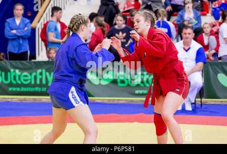 Russia, Vladivostok, 06/30/2018. Sambo competition among girls born in 2003-2004. Teenage tournaments of martial arts and fighting sports. Stock Photo