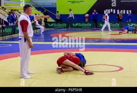 Russia, Vladivostok, 06/30/2018. Sambo competition among girls born in 2003-2004. Teenage tournaments of martial arts and fighting sports. Stock Photo