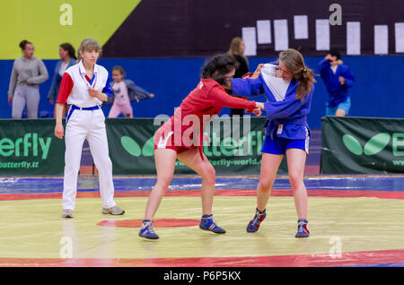 Russia, Vladivostok, 06/30/2018. Sambo competition among girls born in 2003-2004. Teenage tournaments of martial arts and fighting sports. Stock Photo