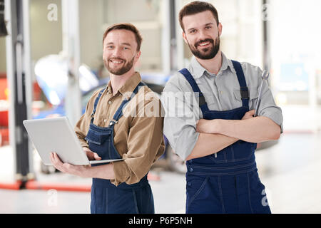 Two Modern Mechanics Posing Stock Photo