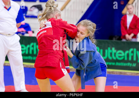 Russia, Vladivostok, 06/30/2018. Sambo competition among girls born in 2003-2004. Teenage tournaments of martial arts and fighting sports. Stock Photo