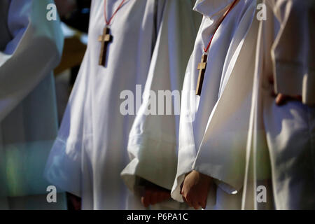 Saint-Jacques church.  Catholic mass. Altar boys.  Sallanches. France. Stock Photo
