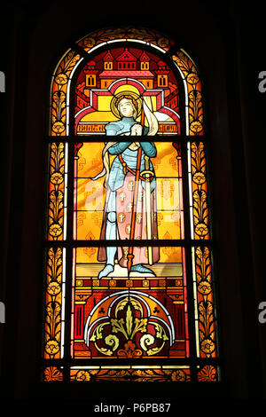 Saint-Pierre de Neuilly catholic church. Neuilly, France. Stained glass window. Joan of Ark. Stock Photo