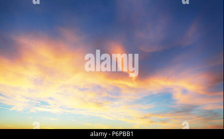 Only sky, dramatic sunset with colorful clouds Stock Photo