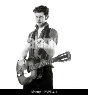 Charlie Waller lead singer of The Rumble Strips band, photographed against a white studio background, Old Street, London, England, United Kingdom. Stock Photo