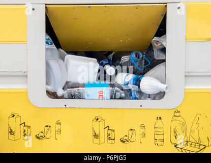 Container for recycling plastic products in street in Spain Stock Photo