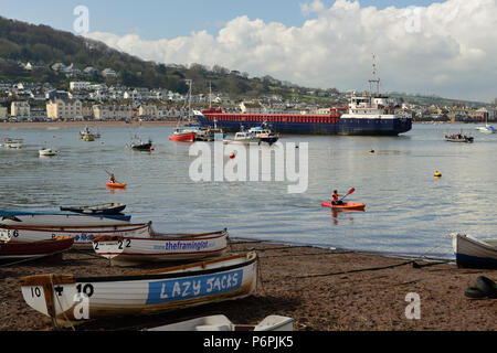 Cargo ship Bon Vivant leaving Teignmouth harbour, and passing Shaldon.