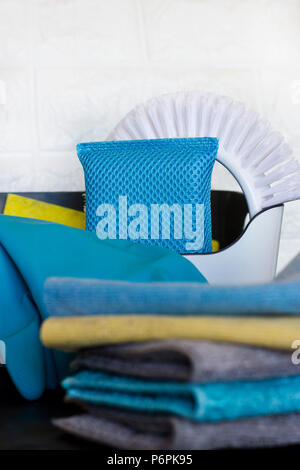 Cleaning stuff. Blue and grey microfiber napkins on the black ground Stock Photo