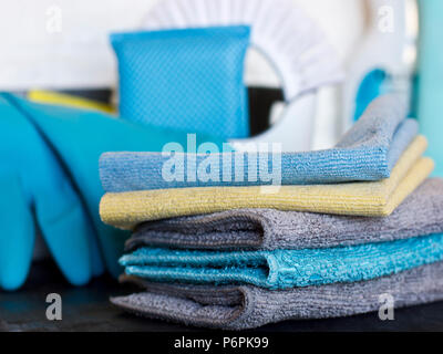 Cleaning stuff. Blue and grey microfiber napkins on the black ground Stock Photo