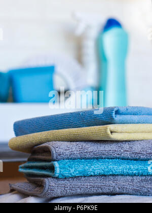 Cleaning stuff. Blue and grey microfiber napkins on the black ground Stock Photo