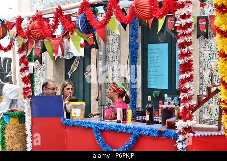 LISBON, PORTUGAL - JUNE 6, 2018: People prepare to Festa Santo Antonio in Alfama district, Lisbon, Portugal. Saint Anthony Festival is a popular stree Stock Photo