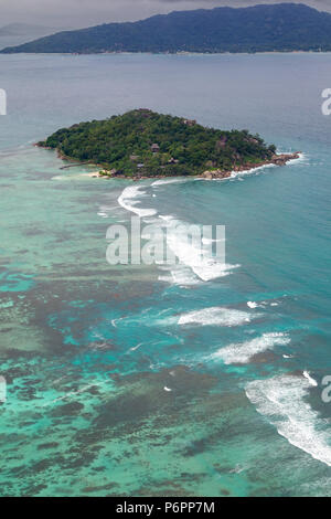 Aerial view of the small island Ile Ronde near Praslin, Seychelles in the Indian Ocean. Stock Photo