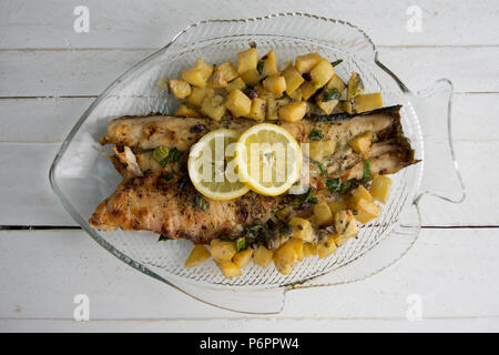 Fish and chips with fresh herbs Stock Photo