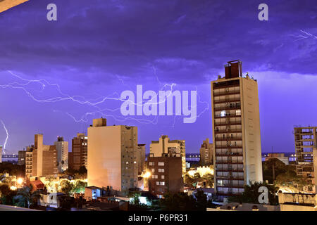 Electrical storm with lots of thunders bolts and lightnings in my neighborhood Stock Photo